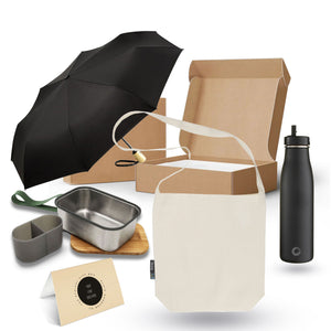 Lifestlye gift pack with a recycled plastic umbrella, a fairtrade tote bag, a reusable water bottle and stainless steel and FSC® bamboo lunch box