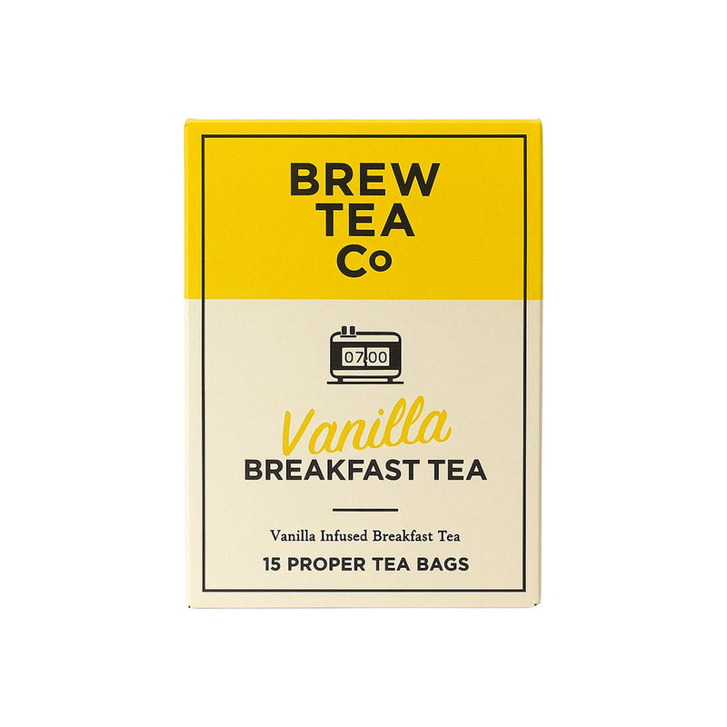 The Morning Hit gift box featuring Raw Bean coffee bags, Brew Tea Co vanilla breakfast tea, and What a Date pecan snacks, presented in a sustainable kraft box with eco sizzle pack and branded sleeve