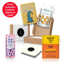 No Nonsense gift box featuring Otherly oat milk chocolate, Brew Tea Co cinnamon breakfast tea, and Mr Filberts crunchy corn, presented in a sustainable kraft box with eco sizzle pack and branded sleeve thumbnail