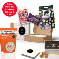 Plant Forward vegan corporate gift box from the ethical gift box, arriving in a co-branded sleeve with Booja Booja truffles and vegan treats thumbnail