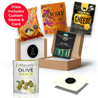 Snack Attack team snack box from the ethical gift box, packaged in a co-branded sleeve with Made For Drink biltong, Mr Filbert's olives and Emily seaweed crisps thumbnail