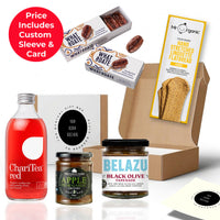 the ethical edit gift box from the ethical gift box, packaged in a co-branded sleeve, a Fairtrade, organic and B Corp spread thumbnail
